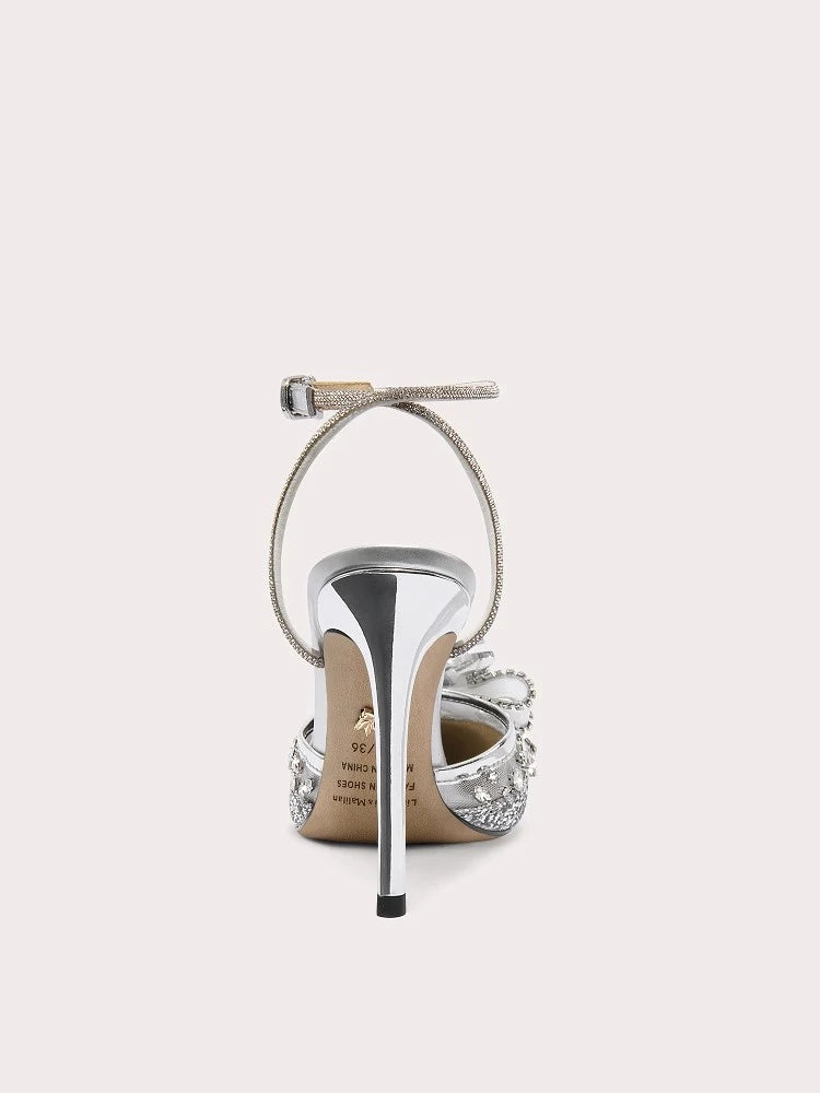 Silver crystal bow party sandal displayed for banquet and summer wedding use on a light grey background