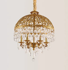 Crystal dome shade pendant in a luxury dining room setting
