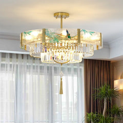 Crystal drum chandelier with brass finish in a modern living room