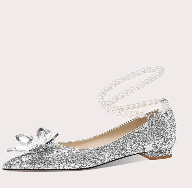 Crystal embellished silver heels with statement bow for events