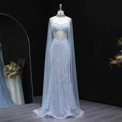Elegant crystal mermaid evening gown with sheer cape in lilac for luxury events on a mannequin against a dark background