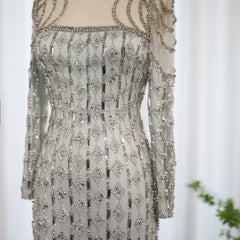Crystal scoop neck Muslim wedding dress with shimmering beadwork on a white background