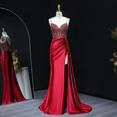 Sweetheart satin mermaid prom gown with crystal bodice on mannequin