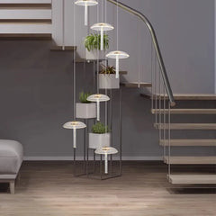 Custom-drop double height pendant for dramatic stairwells