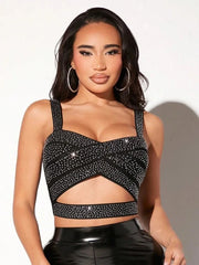 Cut-out tank top paired for glam night events and bold street style
