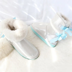 Close-up of faux fur lined snow boots with bows