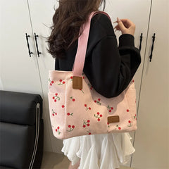 Casual shoulder bag with playful cherry design