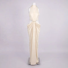 Sleeveless formal gown with gathered twist front and refined finish