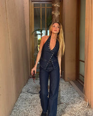 Structured halter vest top styled with wide-leg trousers for an evening look