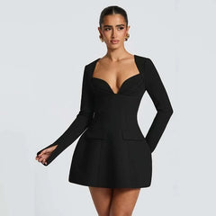 Deep neck black mini party dress with long sleeves and feminine fit