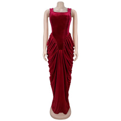 Detailed View  highlighting the bodycon fit and floor-length hem of a deep red velvet-feel maxi dress in soft daylight.
