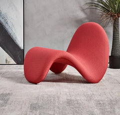 Designer wave chair used as a reading nook seat