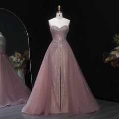 Detachable overskirt tulle evening dress styled for formal parties on a mannequin against a dark background