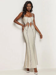 A woman wearing a diamond bandage gown with a hollow-out design.