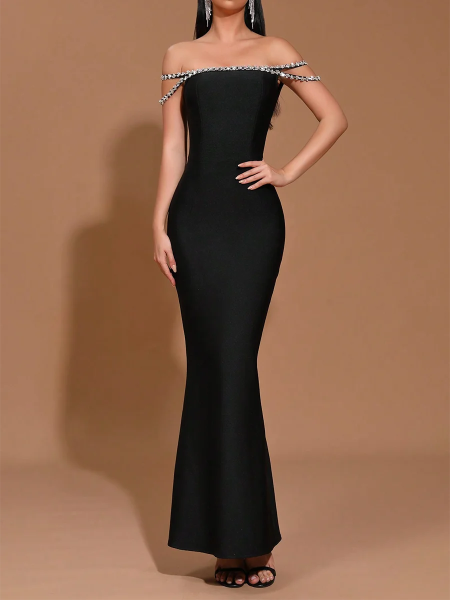“Off-shoulder black sheath dress with diamond spliced detailing and slash neckline”


