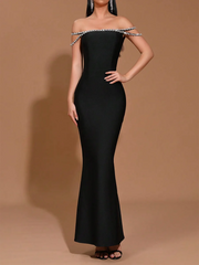 “Off-shoulder black sheath dress with diamond spliced detailing and slash neckline”

