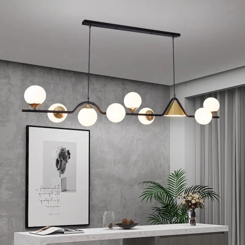 Dimmable globe linear pendant lighting a modern kitchen island
