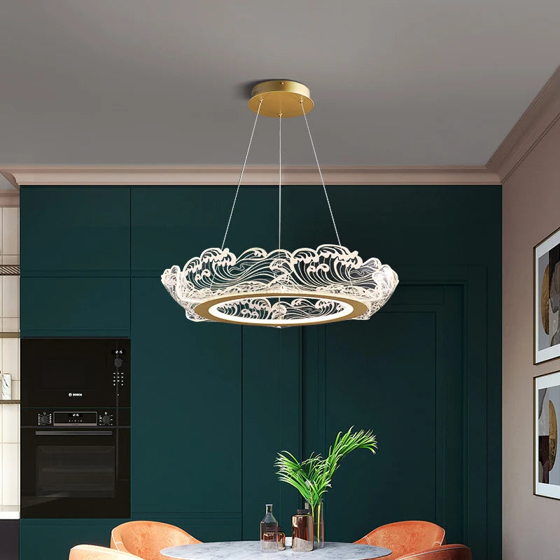 Dimmable gold crystal ring chandelier in a modern open living room
