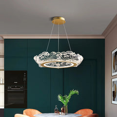 Dimmable gold crystal ring chandelier in a modern open living room