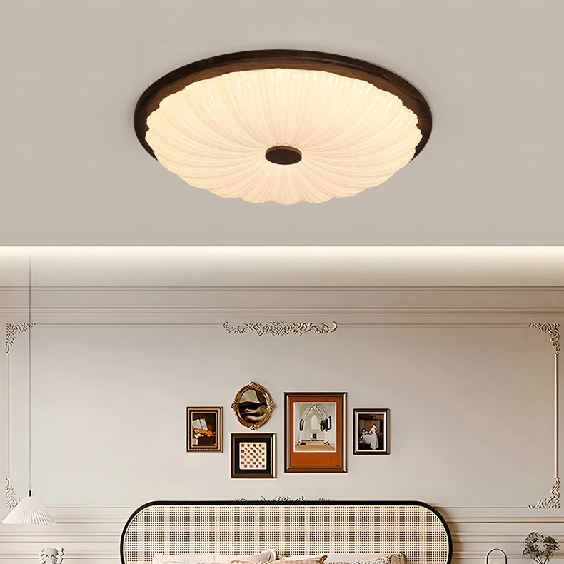 Dimmable petal flush mount ceiling light in a stylish bedroom