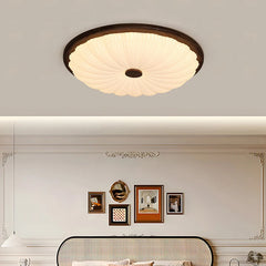 Dimmable petal flush mount ceiling light in a stylish bedroom