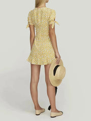 Ditzy print mini dress spring trend with cheerful ruffle hem