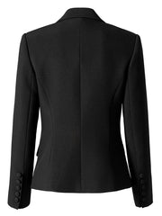 Black tailored blazer showing structured shoulders and a clean, fitted waist.