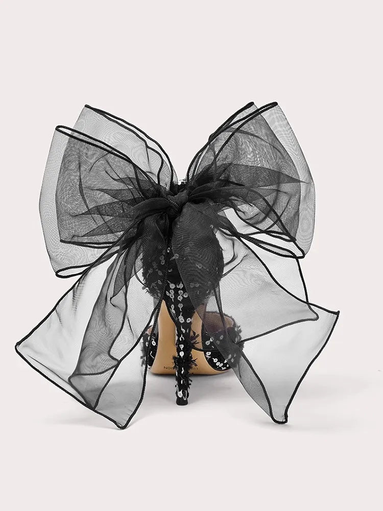 Dramatic pearl embellished event shoes perfect for impactful formal looks