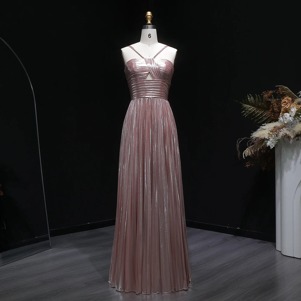 Draped tulle A-line gown with delicate straps and floor-length skirt