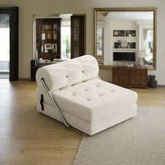 A white fleece dual folding lazy sofa placed on a rug in a room with a reflective floor.