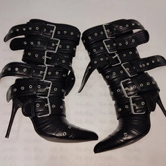 Strappy black boots styled for winter fashion