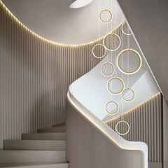An elegant alloy pendant lamp installed in a study, serving as a focal point.