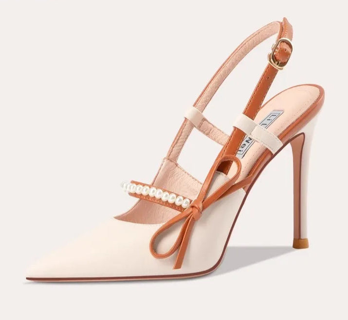 A side view of the elegant thin-heel sandals.