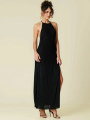 Elegant black halter evening gown modeled for formal occasions