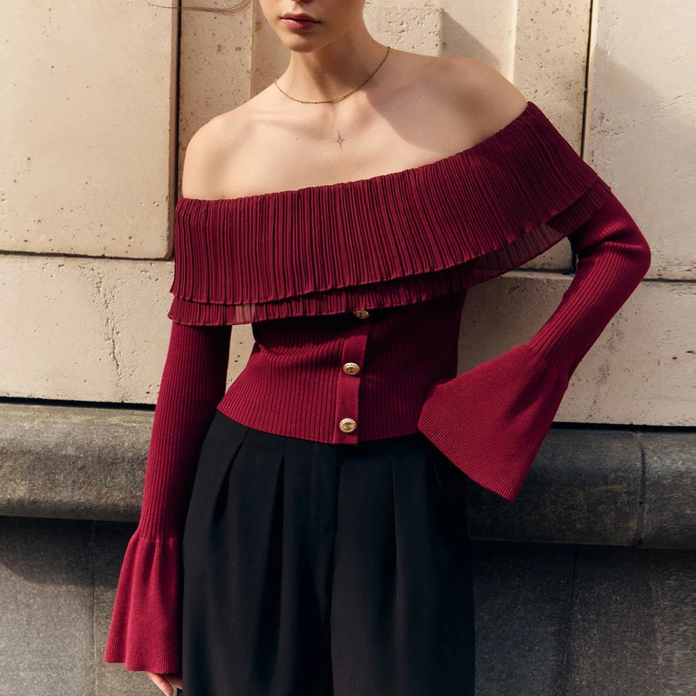 Minimalist burgundy knit top styled for elegant, cool-weather looks

