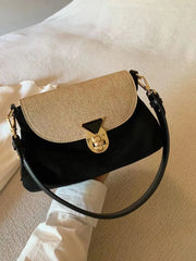 Vintage style crossbody purse with gold-tone clasp closure