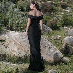 Elegant gala black lace gown worn by women for upscale parties