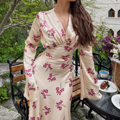 A close-up of the stylish lace-up detail at the waist of the dress.