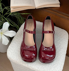 Elegant Mary Jane pumps with bow and square heel