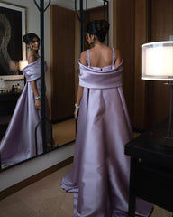 The full length of the elegant mermaid gown, styled for a formal event.