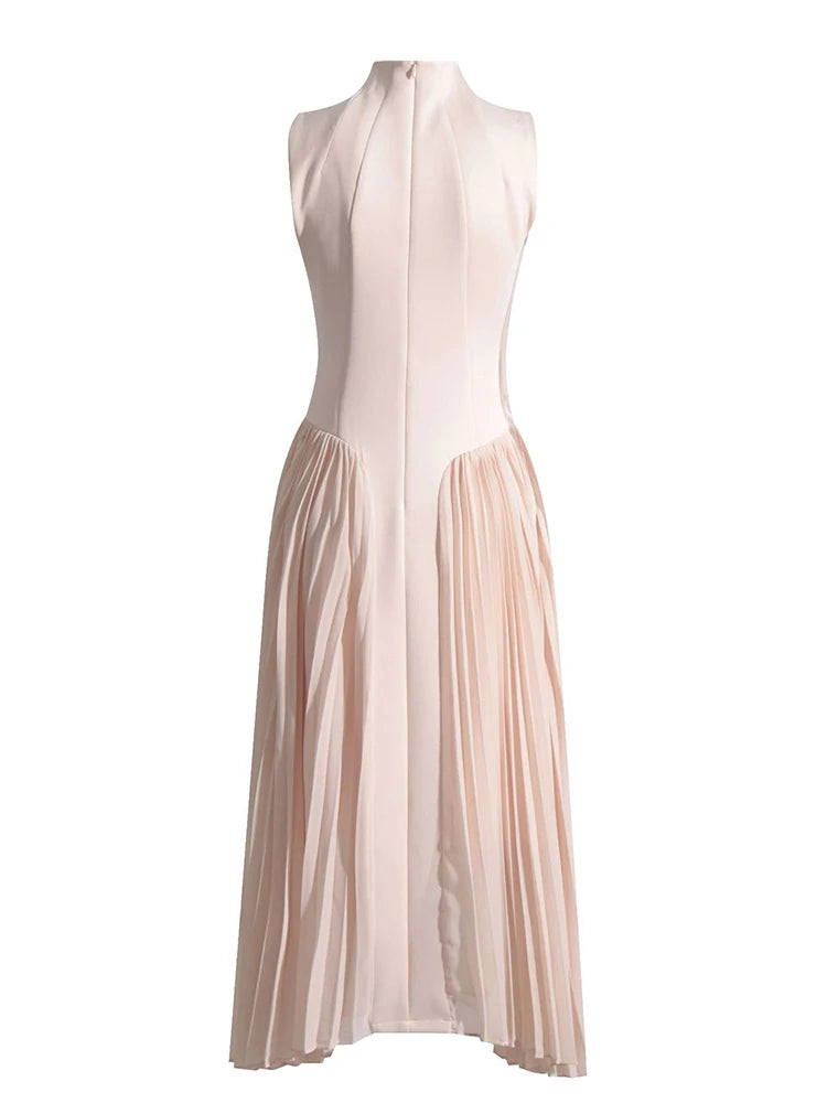 Flat-lay front view of pleated apricot dress with mid-calf hemline