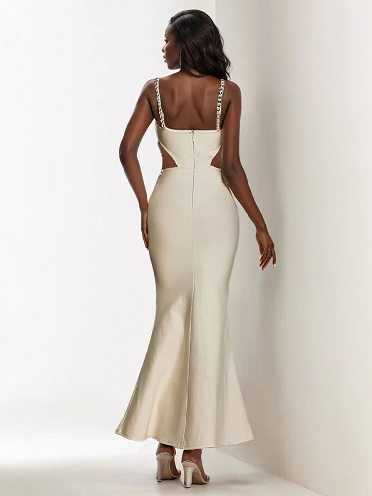 The back view of the dress, showing the elegant zipper closure.