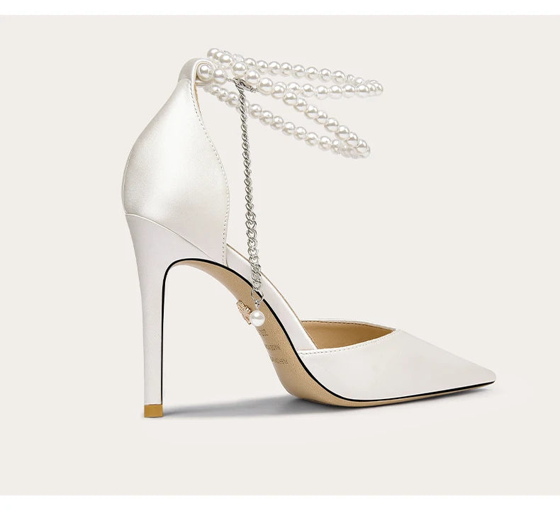Elegant pointed-toe party shoes in white for formal events