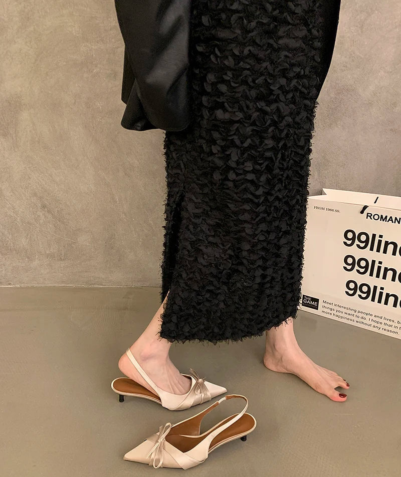 Side view of elegant purple slingback sandals for parties