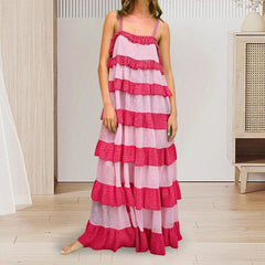 A front view of an elegant ruffle-tiered dress, showing the cascading ruffles.