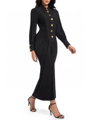 A full-length shot of a slimming sheath gown, styled for a day at the office.