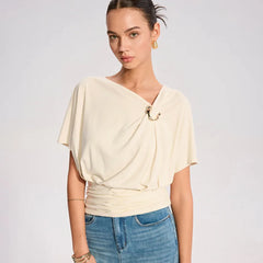 A full-length shot of a slim patchwork female T-shirt styled for a casual day out.