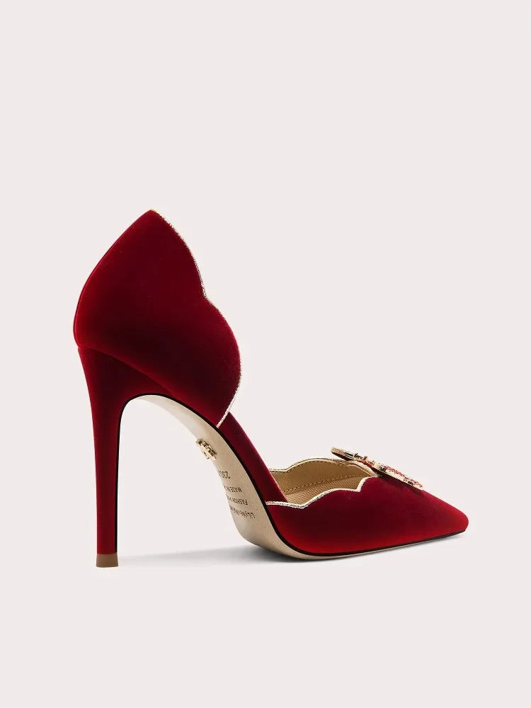 Slip-on suede sandals with crystal butterfly accents