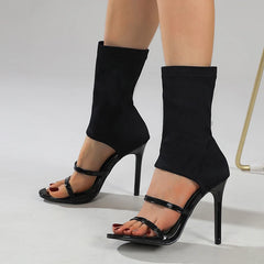 Fashion stiletto elastic boots styled for evening wear