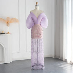 An elegant trumpet silhouette dress shown in full length, showcasing its sleek design.